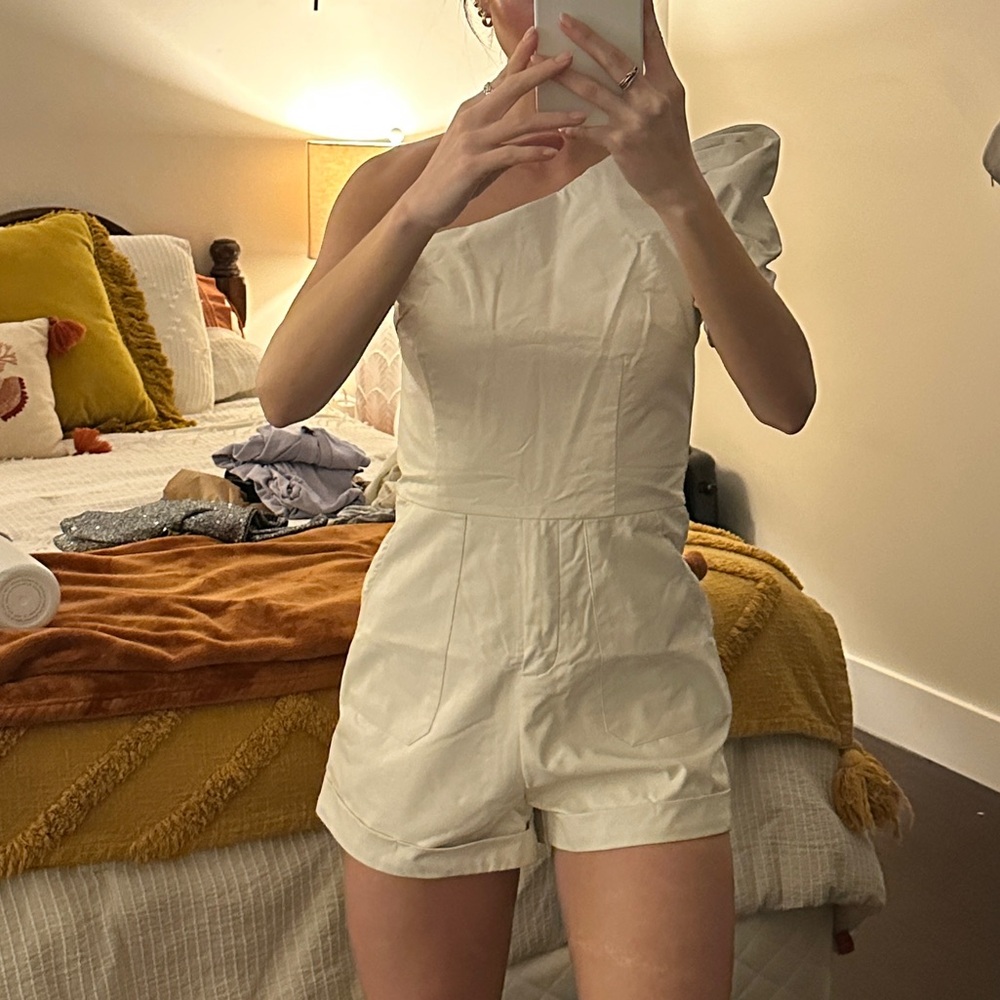 Asymmetrical leather romper